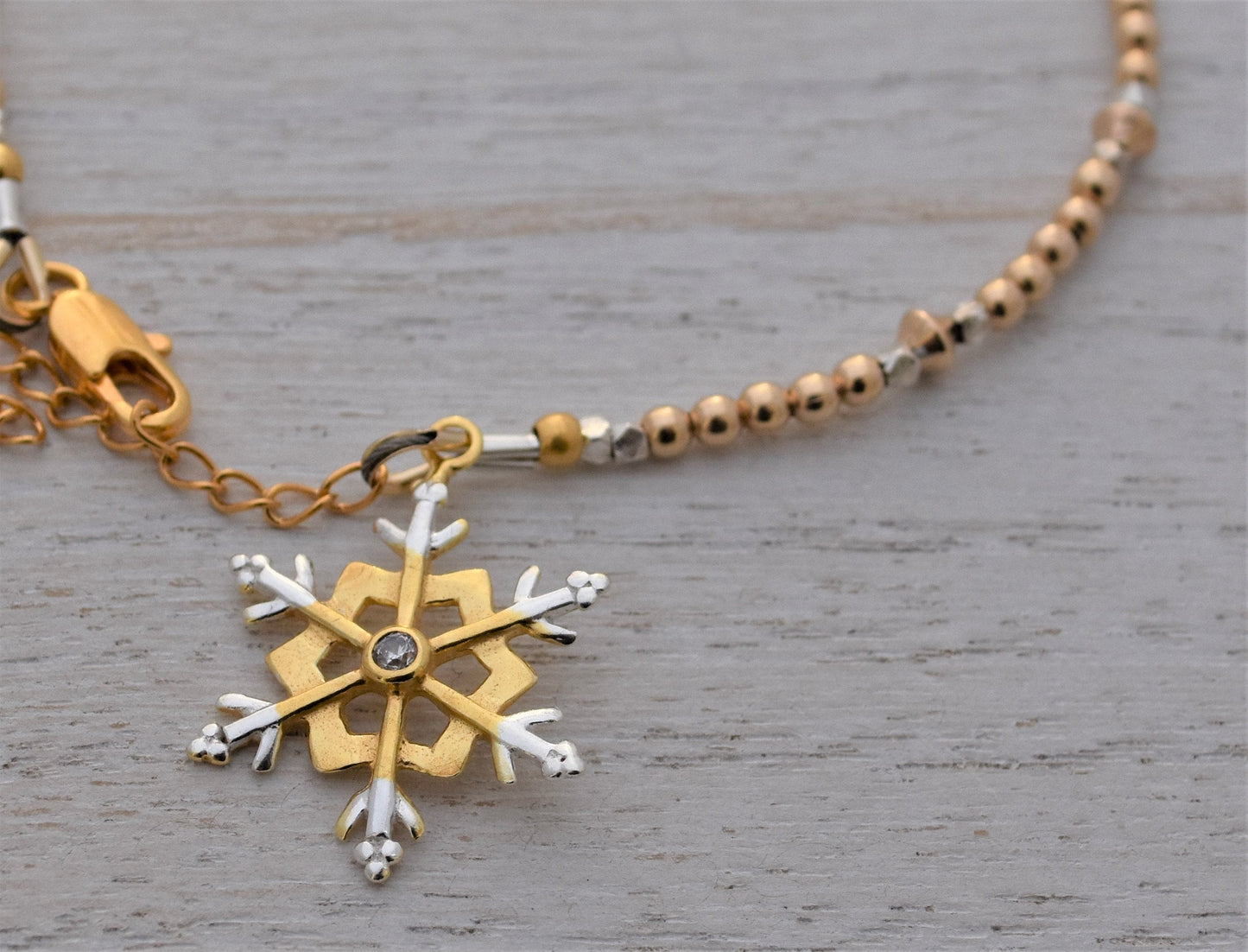 Gold and Silver Snowflake Bracelet